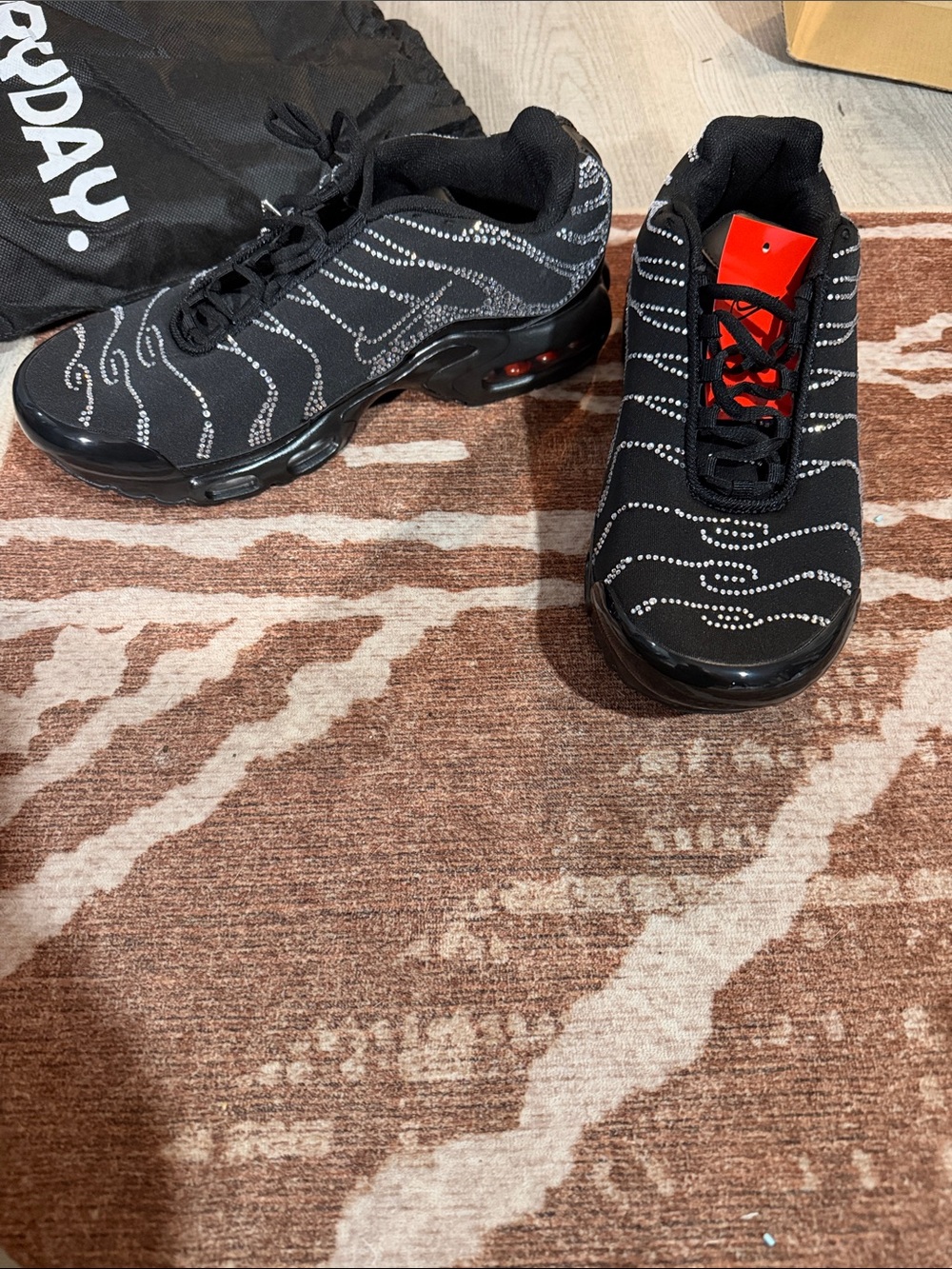 Nike Black Sneakers with Reflective Dot Wave Accents